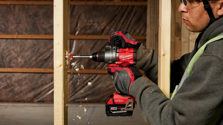 man using One-Key Hammer Drill/Driver