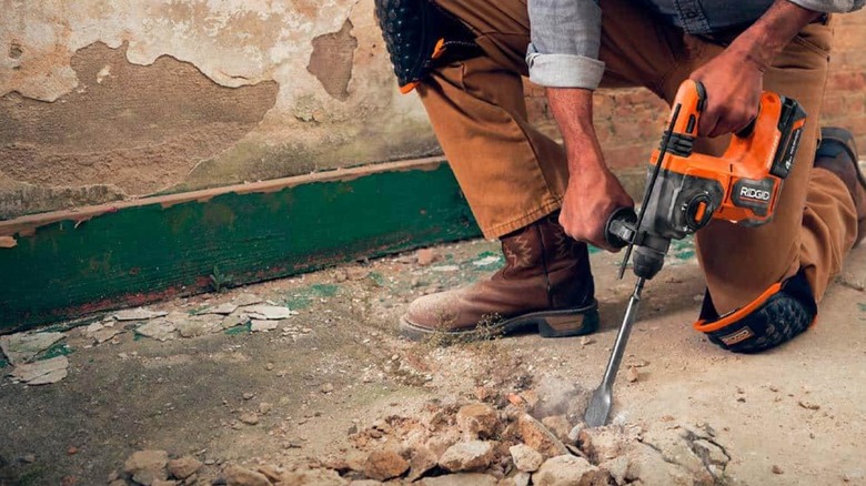 breaking up concrete floor with Ridgid SDS drill