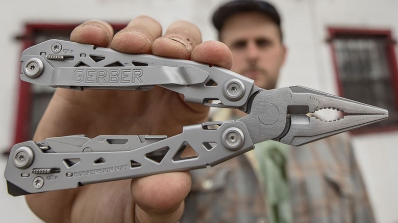 Man holding Gerber Suspension NXT Multi-Tool