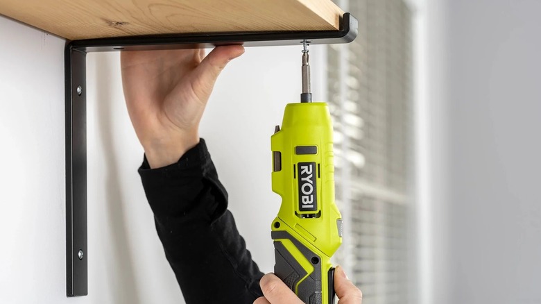 installing shelf with USB lithium screwdriver