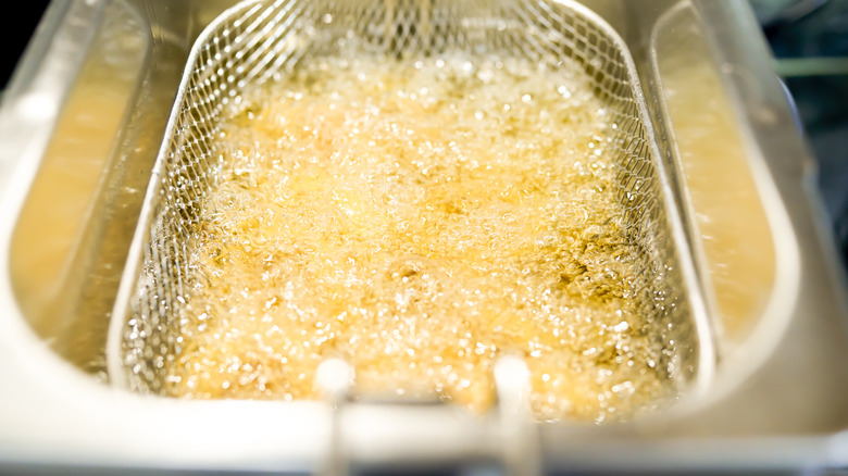Sizzling oil in a deep fryer