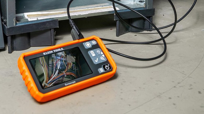 A Klein Tools ET17 borescope looking at some electrical wiring.