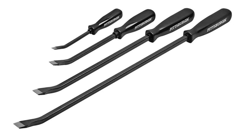 A set of four pry bars in varying sizes against a white background