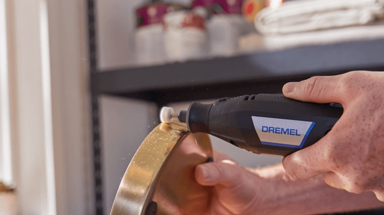 Man using Dremel 3100 Rotary Tool
