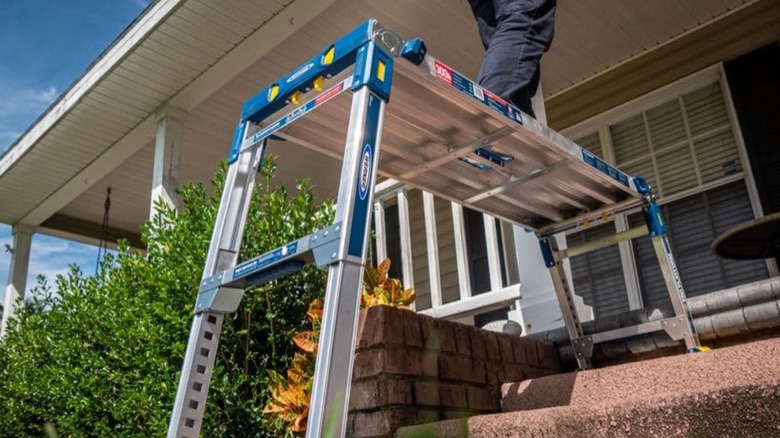 Standing on Werner work platform