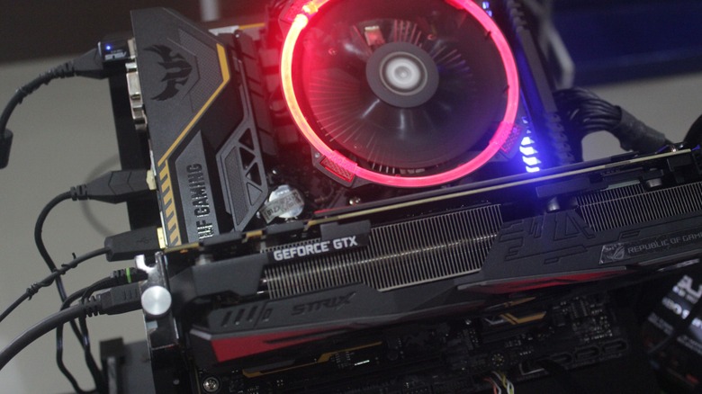 cords plugged into ports on a graphics card