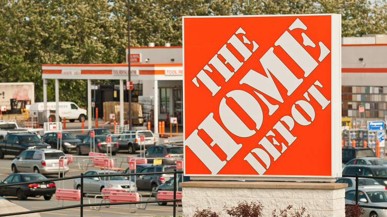 A Home Depot sign in front of a Home Depot location