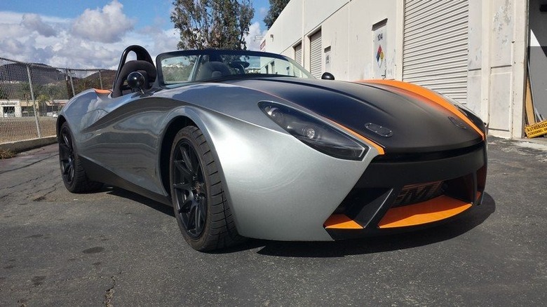 Bauer Catfish Roadster by a workshop