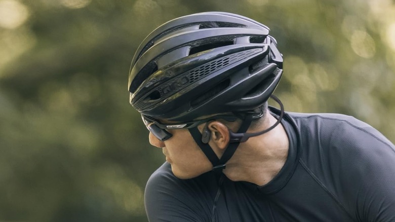 Person wearing Shokz headphones