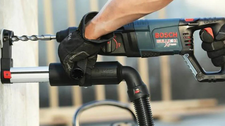 Drilling with Bosch SDS hammer drill.