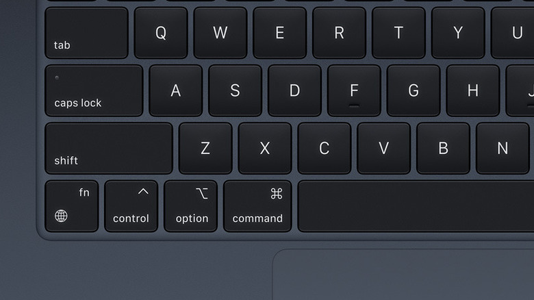 Closeup top-down shot of MacBook Air Keyboard showing Control and Command Keys.