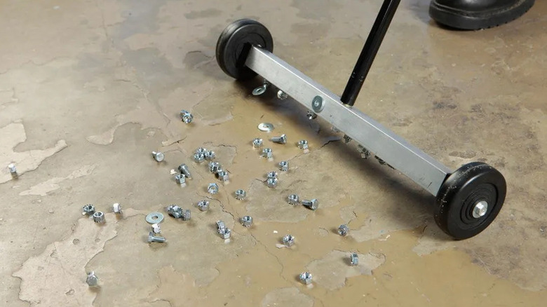 Central Machinery 17-inch mini magnetic sweeper clearing up dropped parts