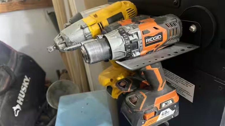 Magnetic rack holding power drills