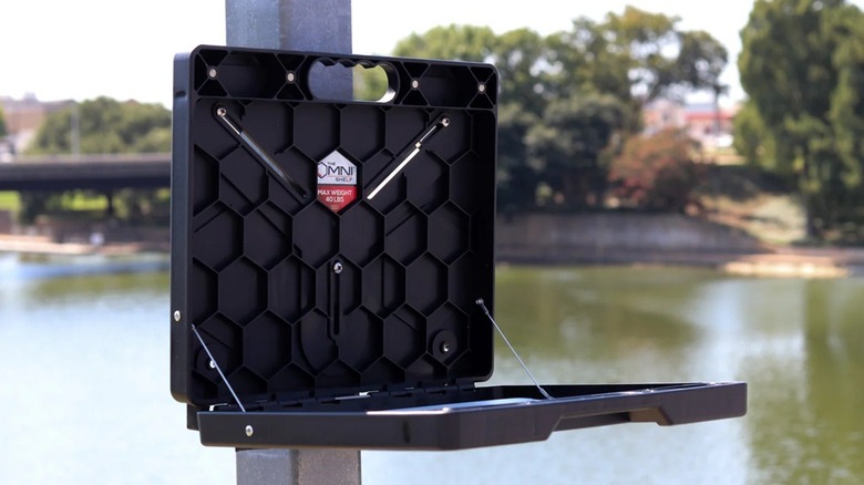 An OmniShelf stuck to pole