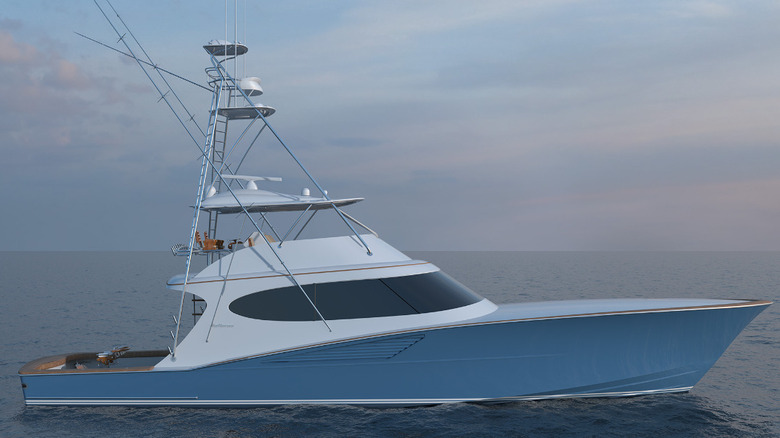 Blue and white Hatteras 77 Yacht on the water