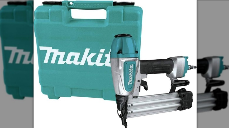 Person using Makita AF506 Brad Nailer