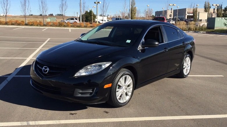 A white 2010 Mazda6 GS parked