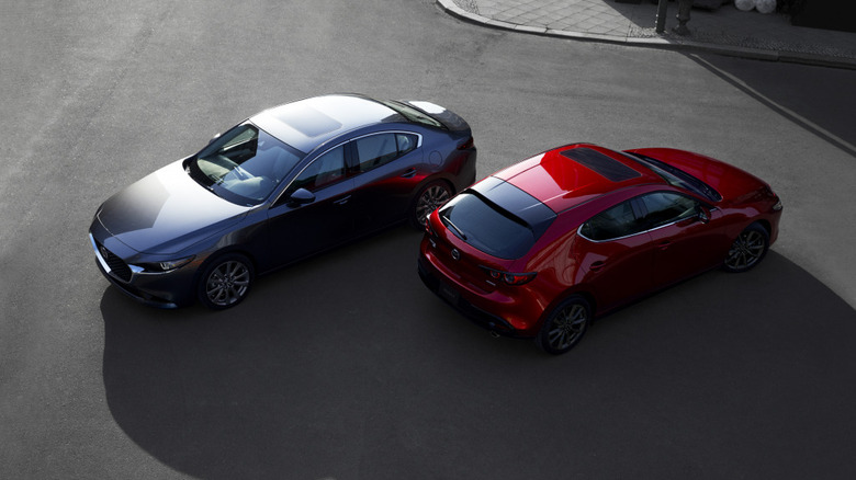 Two 2018 Mazda3 parked next to each other