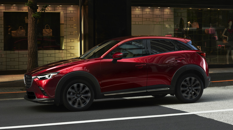A red 2019 Mazda CX-3 driving