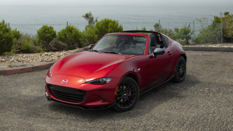 A red 2019 Mazda MX-5 RF parked