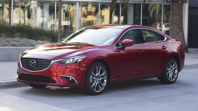 A red 2017 Mazda6 parked