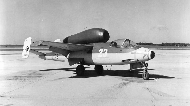 heinkel he 162 fighter jet on tarmac