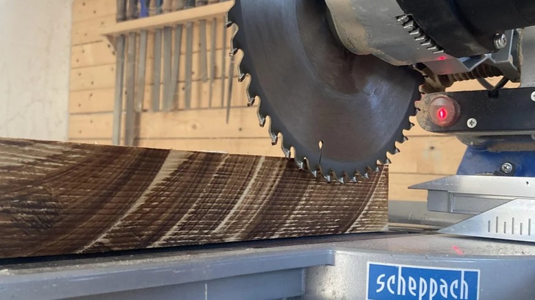 scorch marks on a board cut with a dull miter saw blade