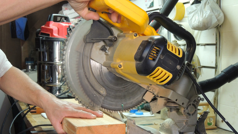 preparing to cut a board
