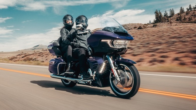 Two riders on a Harley-Davidson Road Glide