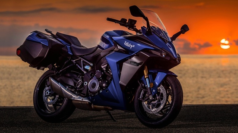 Suzuki GSX-S1000GT+ parked at the beach at sunset