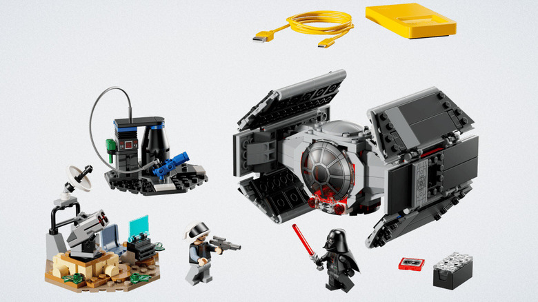 A complete LEGO set with Darth Vader and his TIE Fighter