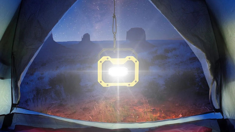 Braun work light hung from a tent