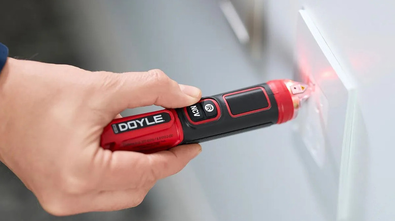 Doyle voltage tester testing an outlet