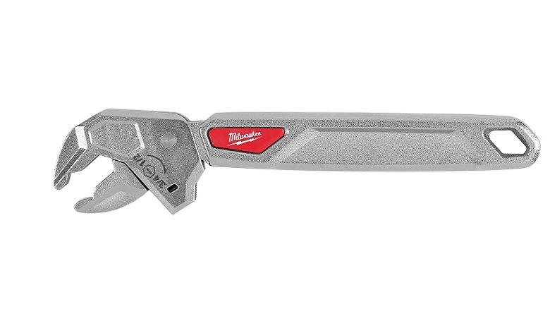 An adjustable wrench against a white background.