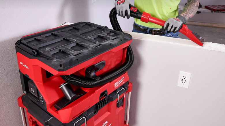 Cleaning a jobsite with a Milwaukee M18 Fuel wet/dry vac