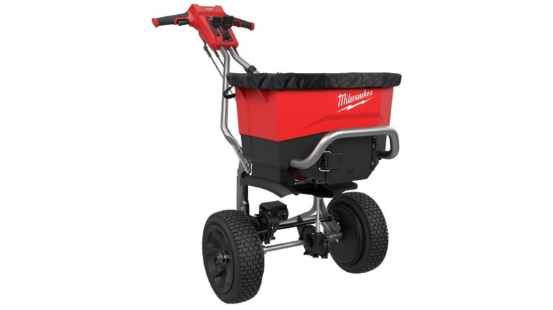 Milwaukee M18 self-propelled broadcast spreader against a white background