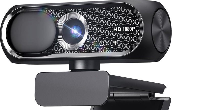 A USB webcam with a cover on it.