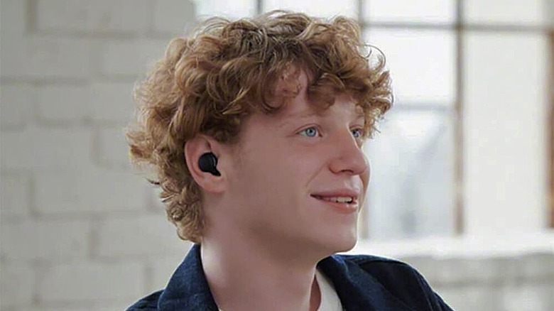 A red-haired man wearing Sony WF-C500s.