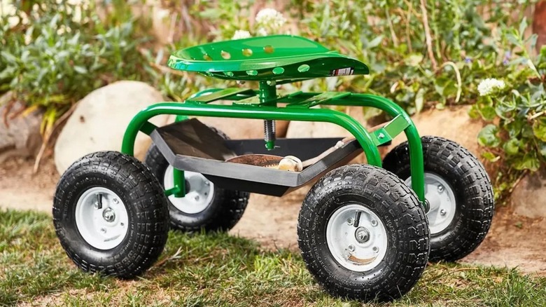 One Stop Gardens rolling work seat with tools underneath
