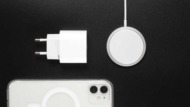 white iphone with wireless charger