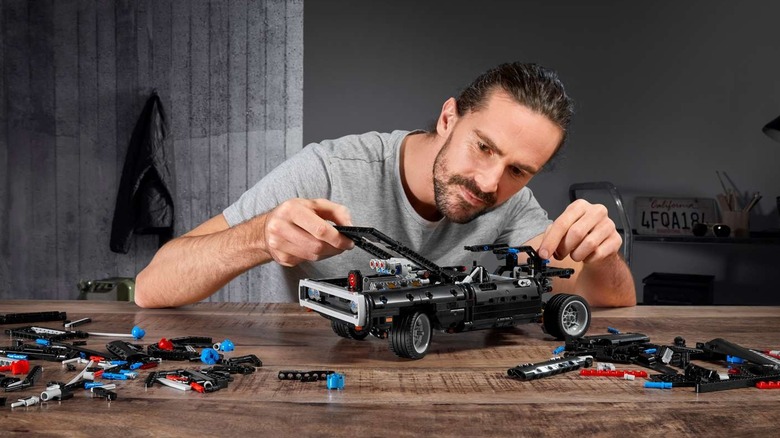 A man building Dom's Didge Charger.