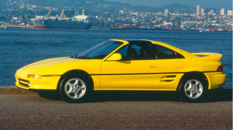 Yellow second gen Toyota MR2 parked