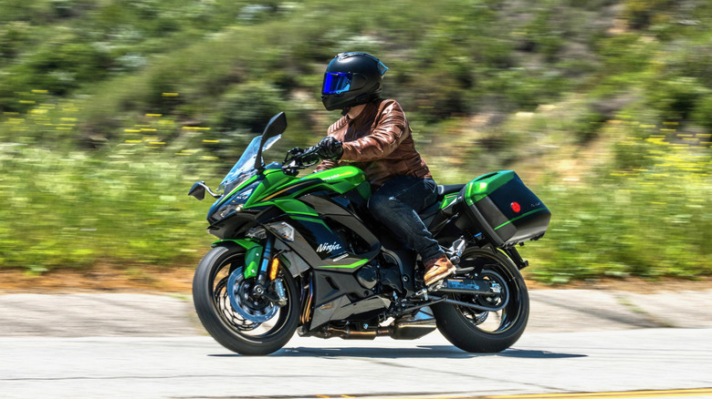 Rider wearing black Arai Corsair-X helmet