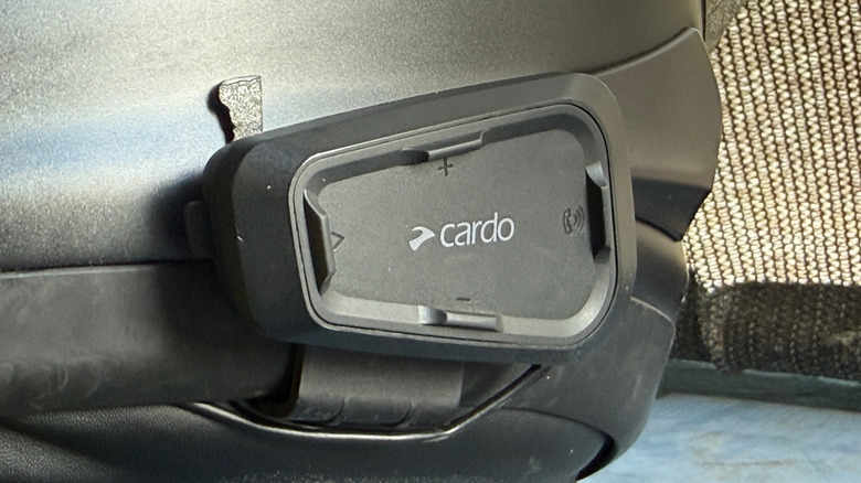 Cardo communication device attached to Arai helmet