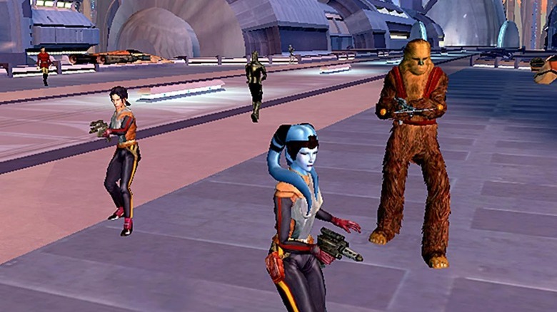Various Star Wars species holding blasters