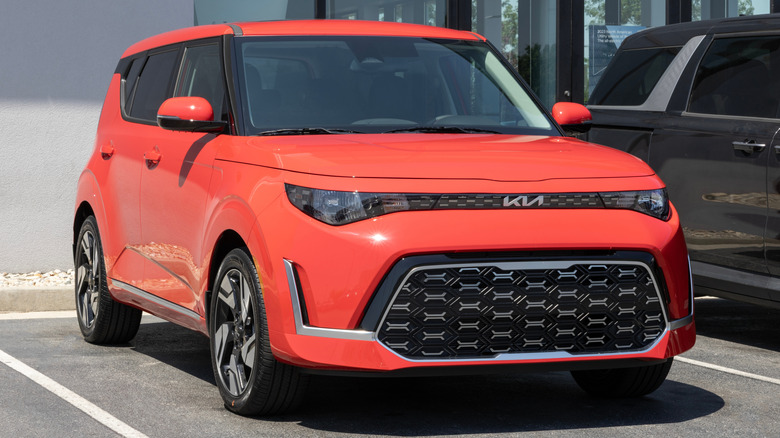 Orange 2025 Kia Soul in a parking lot
