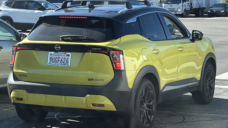Yellow 2026 Nissan Kicks in transit