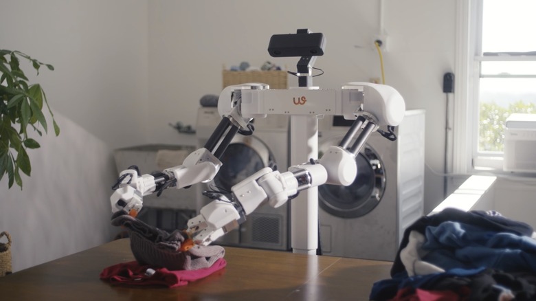 Isaac 0 robot from Weave Robotics folding laundry.