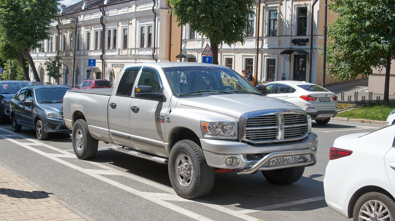 A grey 2007 RAM 2500 Quad cab parked on the street