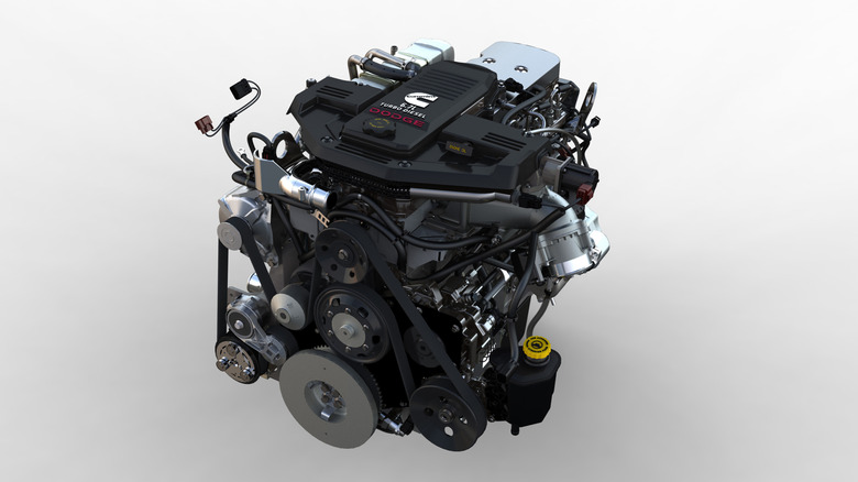 A Ram 3500 HD 6.7L Turbo Diesel Engine against a white studio background